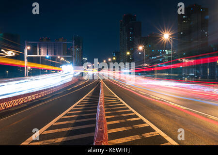 Car traffic at night on a chinese elevated road in Chengdu city Stock Photo