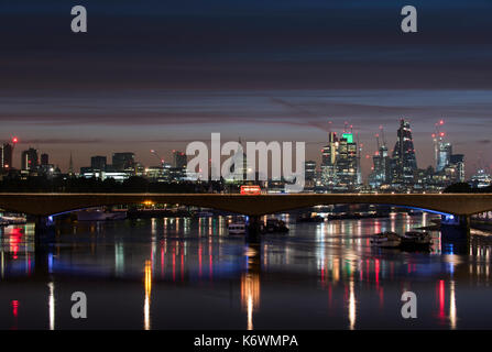 Vintage London Bus on Waterloo Bridge at Night Stock Photo