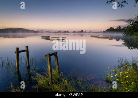 Capturing Sunrise on Loch Rusky, Nr Aberfoyle, Central Scotland Stock Photo