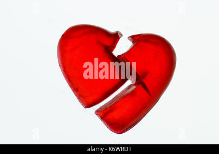 Premium Photo  White broken styrofoam heart on a red backdrop