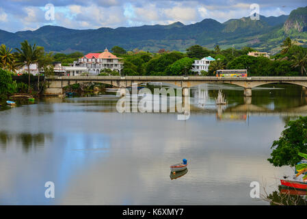 River scene at sunset in Mahebourg, Mauritius. Mauritius is an island nation in the Indian Ocean about 2,000 km off the southeast coast of the African Stock Photo