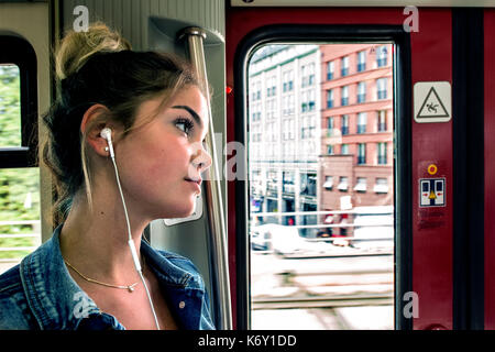 Germany A girl on a wagon of Berlin's subway Stock Photo