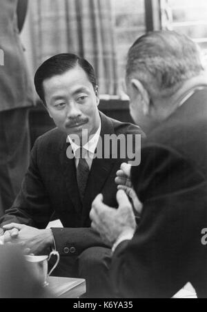 President Lyndon B. Johnson with South Vietnam Prime Minister Nguyen Cao Ky during a break in formal meetings concerning the Vietnam situation. Honolulu, Hawaii, 1965. Stock Photo