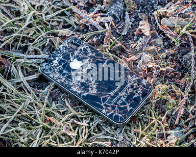 Damaged, dropped, iPhone 4 - France. Stock Photo