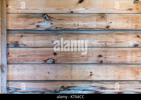 Old wood plank wall from the inside of an old shed in the UK Stock Photo