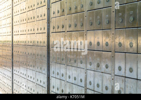 Wall of deposit safe boxes in a bank Stock Photo