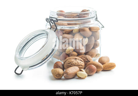 Different types of nuts in the nutshell. Hazelnuts, walnuts, almonds, pecan nuts and pistachio nuts isolated on white background. Stock Photo