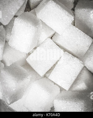 White Sugar cubes closeup. Stock Photo