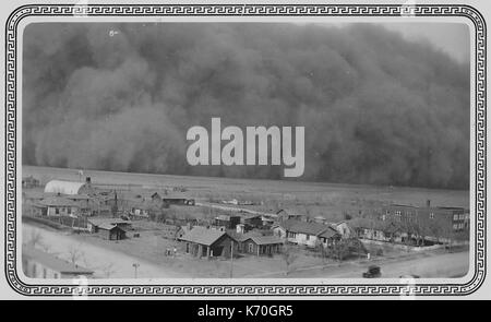 Approach of a massive dust storm in Rolla, Kansas. Picture taken from a water tower one hundred feet high. Photo by Charles P. Williams, 5/6/35. Stock Photo