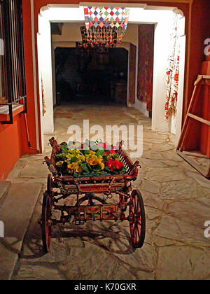 Old cart with flowers on the old street in Istanbul, Turkey Stock Photo