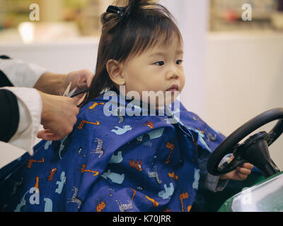 Asian Baby Girl Do Hair Cut First Time In Hairdressing Shop