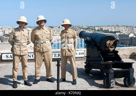 Uniformed personnel of the the Saluting Battery in Valletta, the capital of Malta. Stock Photo