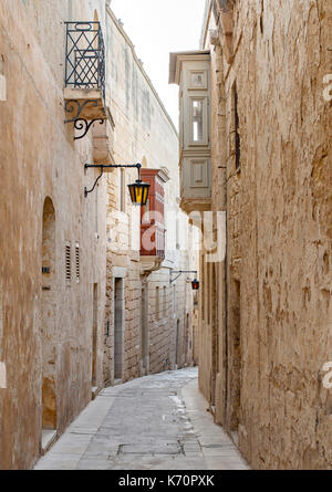 Narrow streets of the historic fortified city of Mdina (Città Vecchia or Città Notabile) in Malta. Stock Photo