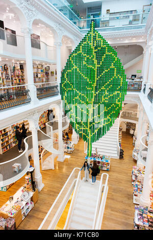 Carturesti Carusel in Bucharest is a modern book/gift shop with a bistro.  It is in a refurbished historic building in the old town. Stock Photo