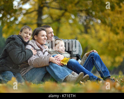 family posing  in park  Stock Photo