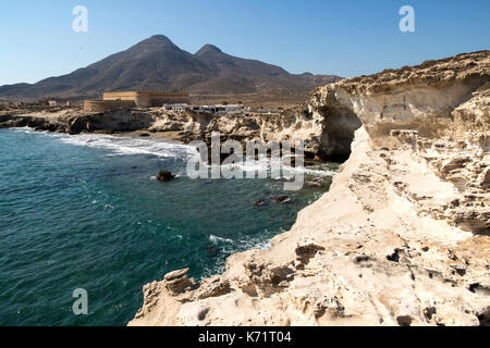 Volcanoes and fossilised sand dune rock structure, Los Escullos, Cabo de Gata natural park, Almeria, Spain Stock Photo