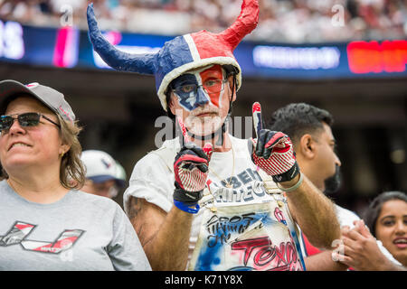 Jacksonville Jaguars vs. Houston Texans. Fans support on NFL Game.  Silhouette of supporters, big screen with two rivals in background Stock  Photo - Alamy