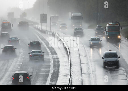 North Wales, UK.  UK Weather. Wet showery weather and cooler temperatures for the coming days for many parts of the UK as these drivers discovered tackling the hazardous driving conditions on the A55 near the village of Halkyn, Flintshire, North Wales Stock Photo