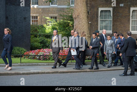 10 Downing Street, London UK. 14 September, 2017. The Prime Minister of Malaysia, Najib Razak, is welcomed to 10 Downing Street by British PM Theresa May. The Malaysian delegation lead Minister of Foreign Affairs Anifah Aman MP into No 10. Credit: Malcolm Park/Alamy Live News. Stock Photo