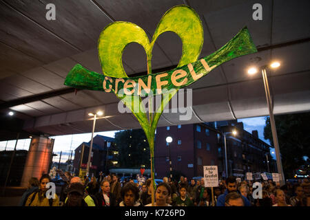 North Kensington, London, UK. 14th Sep, 2017. Hundreds join the silent walk in solidarity with the bereaved families and residents from the Grenfell tower fire 3 months ago on the 14th of June. The silent walk is held on the 14th of every month to pay respects. Today's march is also the opening day of the Grenfell tower fire public enquiry. 14th September 2017. Credit: Zute Lightfoot/Alamy Live News Stock Photo