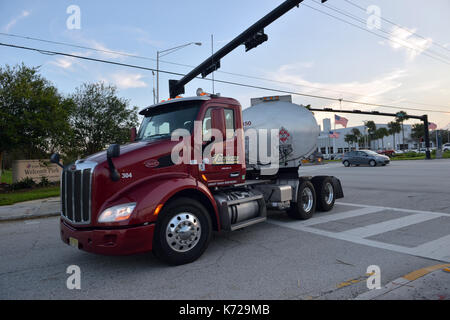 FORT LAUDERDALE, FL - SEPTEMBER 14: Gas trucks speed in and out of the Port of Fort Lauderdale. Florida starts to clean up as it struggles to get back online with gas and electric. Millions are still without power after Extreme Category 5 Hurricane Irma Which Is The largest Storm In US History hit the state on September 14, 2017 in Fort Lauderdale, Florida. People: Gas Tanker at Port of Fort Luaderdale Transmission Ref: FLXX MPI122/MediaPunch Stock Photo