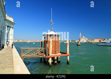 Venice Acqua alta high tide level hydrographic observation station at Punta della Dogana, Canale della Giudecca Stock Photo