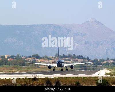 TUI airlines, flight number G-OOBN taking off at Ioannis Kaposistrias airport Corfu, Greece Stock Photo