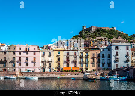 View of ancient village of Bosa on Temo river in a sunny morning of summer - Sardinia - Italy Stock Photo