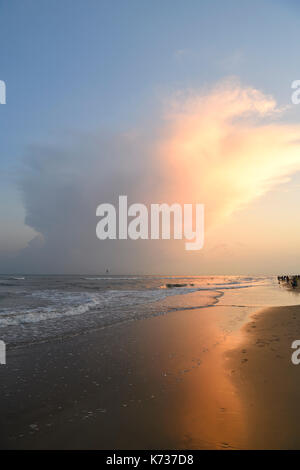 Storm cloud on the beach thunderstorm tornado Stock Photo