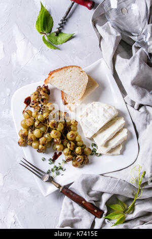 Cheese and grapes. Stock Photo