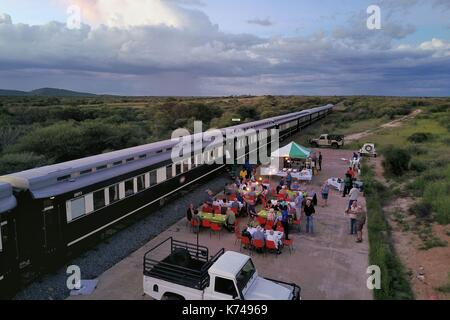 Namibia, Otjozondjupa region, diner next to the Shongololo express train (aerial view) Stock Photo