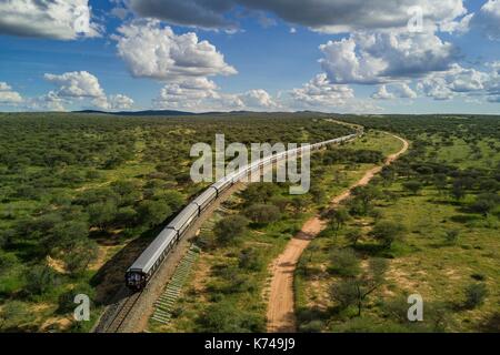 Namibia, Otjozondjupa region, the Shongololo express train crossing the Namibian bush towards Kalkfeld (aerial view) Stock Photo