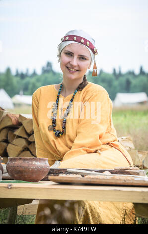 MOSCOW,RUSSIA-June 06,2016: Beautiful young peasant woman posing in romanian traditional costume Stock Photo