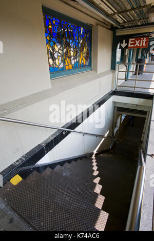 Photo of the stairs from 33rd Street Rawson Street station platform along the elevated #7 line in Long Island City, Queens, New York. Stock Photo