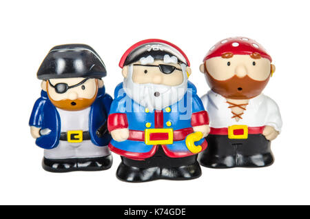 three pirate toy figures on a white underground Stock Photo
