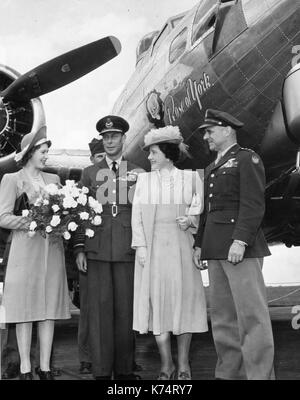 Princess Elizabeth, King George VI and Queen Elizabeth with US Army Air Forces Lt Gen James Doolittle (l-r) at the christening of the Boeing B-17 bomber 'Rose of York' by the young Princess, England, 7/6/1944. Stock Photo