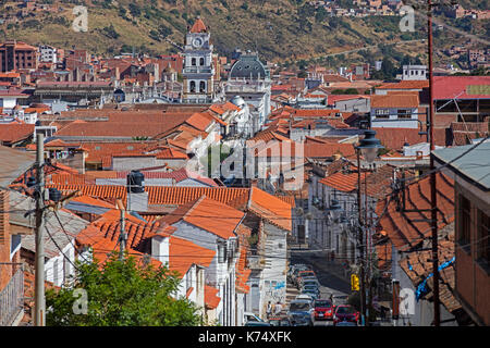 Aerial view over colonial street and rooftops in the white city of Sucre, constitutional capital of Bolivia in the Oropeza Province Stock Photo
