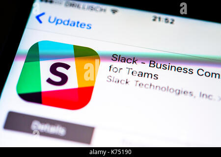Slack app in the Apple App Store, app icon, display on a screen of a ...