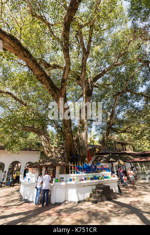 KANDY, SRI LANKA - February 12, 201t: The view on courtyard of Vishnu Devalaya Temple during prayer time, EDITORIAL Stock Photo