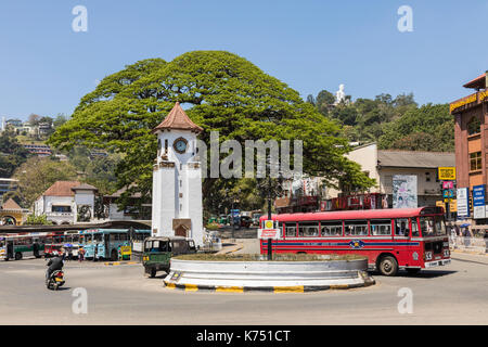 Kandy, Sri Lanka - February 12, 2017: City traffic, Clock tower in downtown Kandy Stock Photo