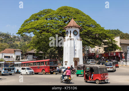 Kandy, Sri Lanka - February 12, 2017: City traffic, Clock tower in downtown Kandy Stock Photo