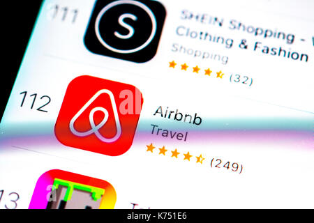 Airbnb app in the apple App Store seen on an iPhone 12 screen Stock ...