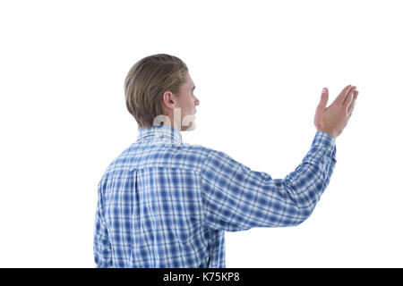 businessman gesturing during presentation against white background Stock Photo
