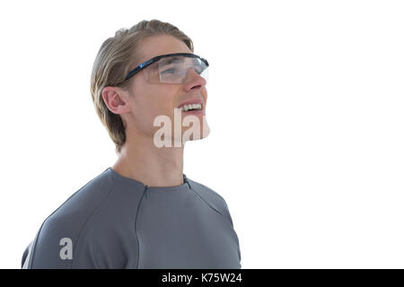 Smiling businessman wearing smart glasses white standing against white background Stock Photo