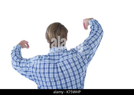 Rear view of businessman advertising imaginary product during presentation against white background Stock Photo