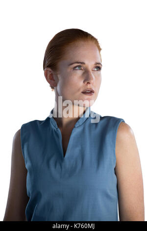 Close up of contemplated businesswoman with gray eyes against white background Stock Photo