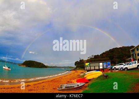 Rainbow over the Baby of Islands Stock Photo