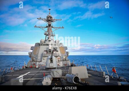 The Arleigh Burke-class guided-missile destroyer USS Oscar Austin (DDG 79) Stock Photo