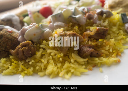 NYC street style Halal chicken and yellow rice with falafel and pita ...