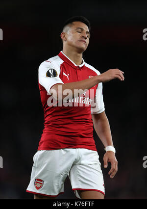 Arsenal's Alexis Sanchez looks dejected during the Europa League match at the Emirates Stadium, London. Stock Photo